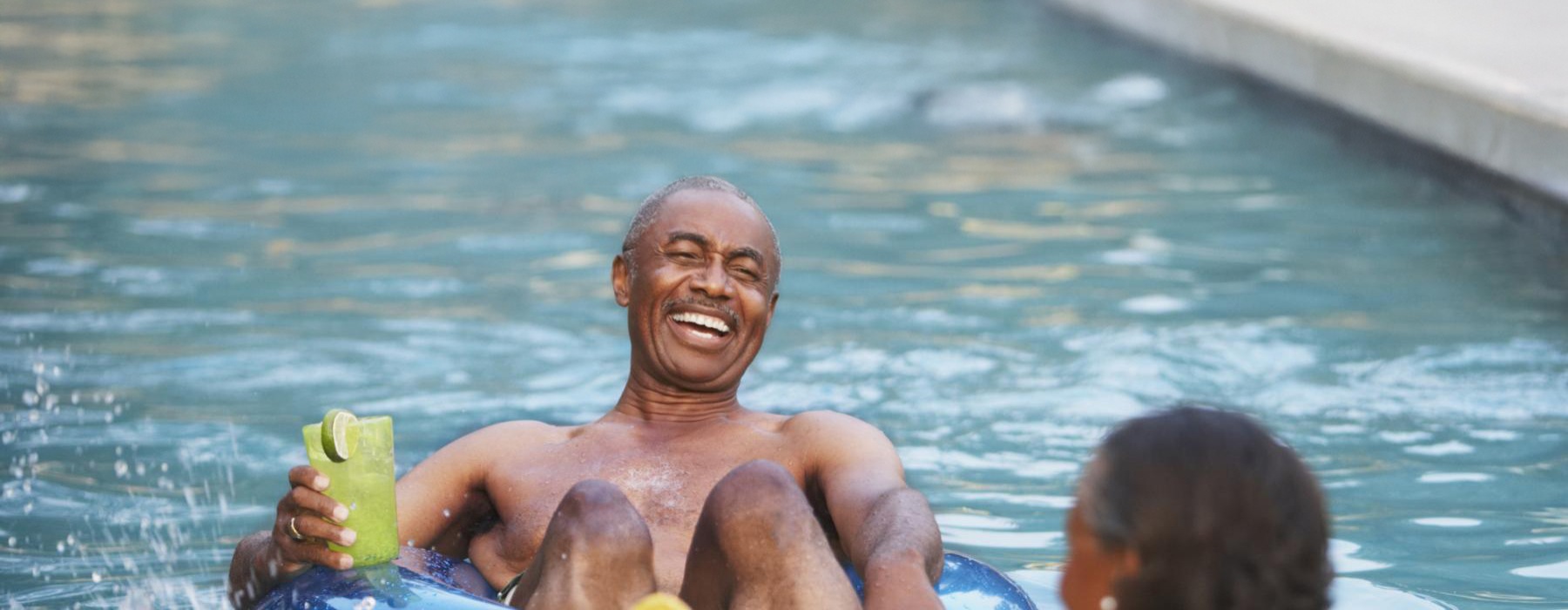 a man and a woman in a pool