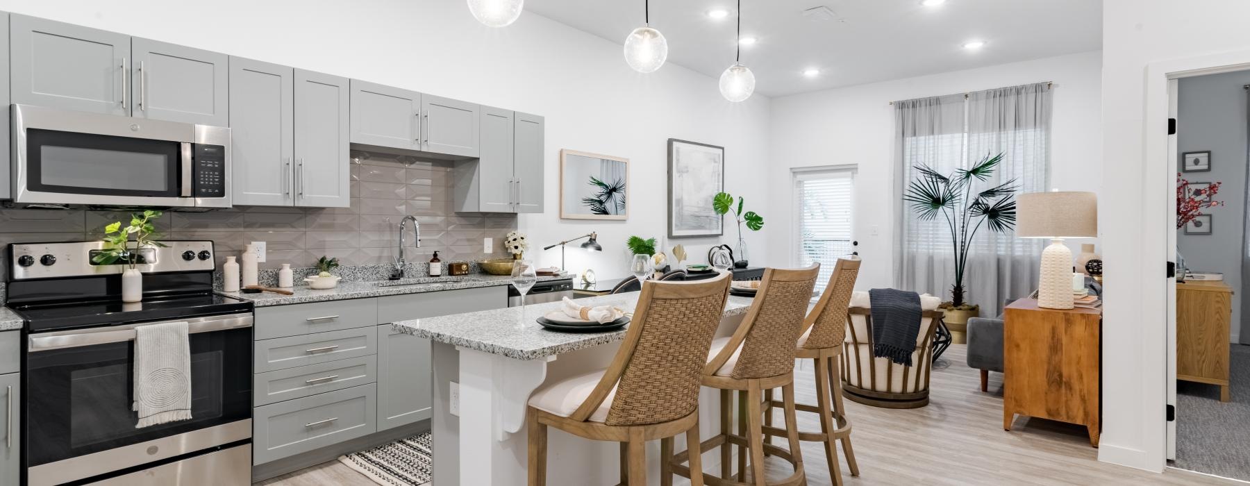 a kitchen with white cabinets