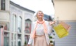 a woman holding shopping bags